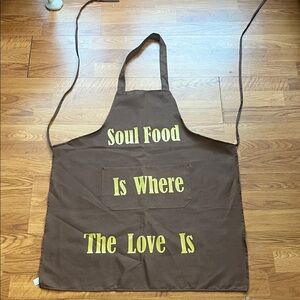 Brown Apron with Yellow Text by [Brand]